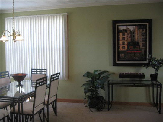 10113 Monarch Road Roscoe, IL 61073 - Photo 4 of 8 a dining room with furniture and window