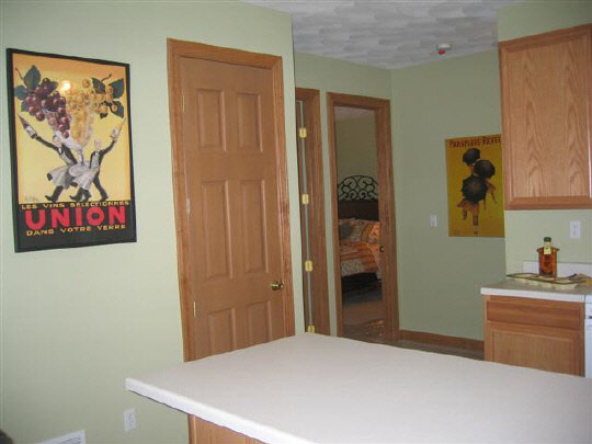 10113 Monarch Road Roscoe, IL 61073 - Photo 6 of 8 a bedroom with a bed and a view of bathroom