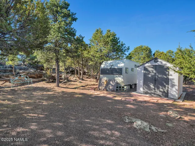 a view of a street with some trees