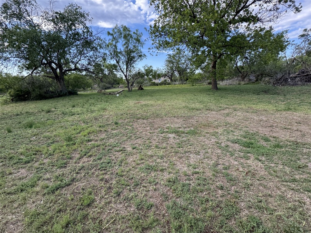 906 West 4th Street Sweetwater, TX 79556 - Photo 1 of 3 a view of a field with trees in the background
