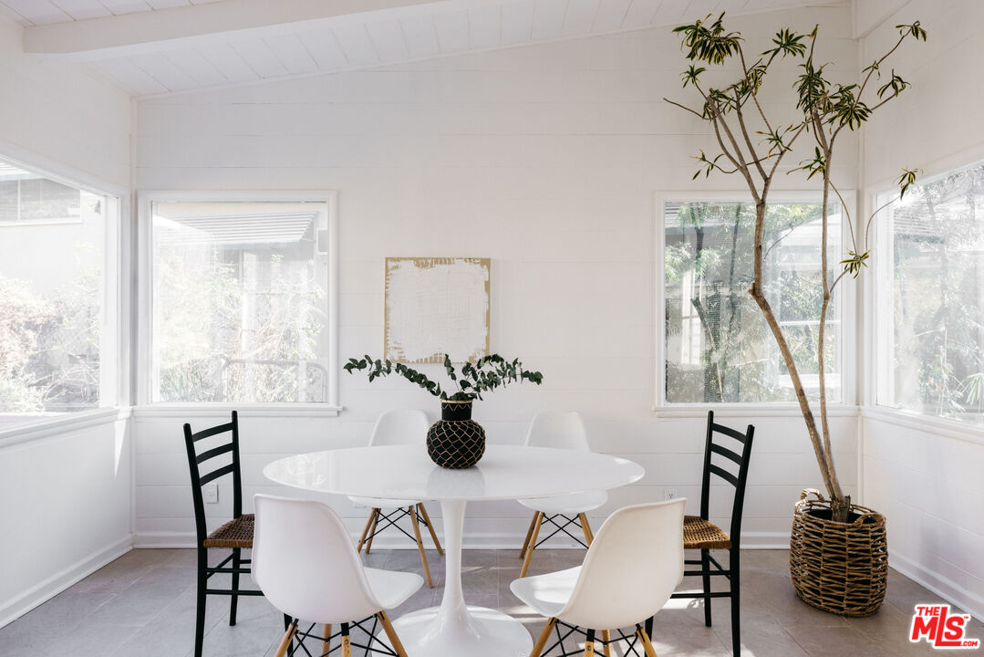 5907 Meridian Street Los Angeles, CA 90042 - Photo 13 of 27 a view of a dining room with furniture window and outside view