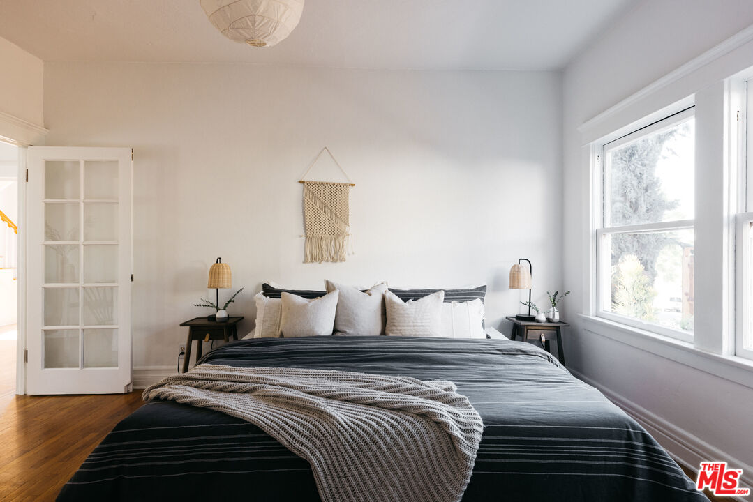 5907 Meridian Street Los Angeles, CA 90042 - Photo 15 of 27 a bedroom with bed and window