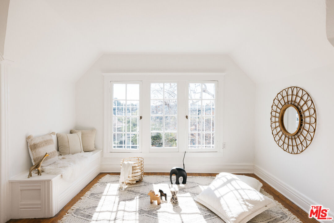5907 Meridian Street Los Angeles, CA 90042 - Photo 19 of 27 a living room with furniture and a window