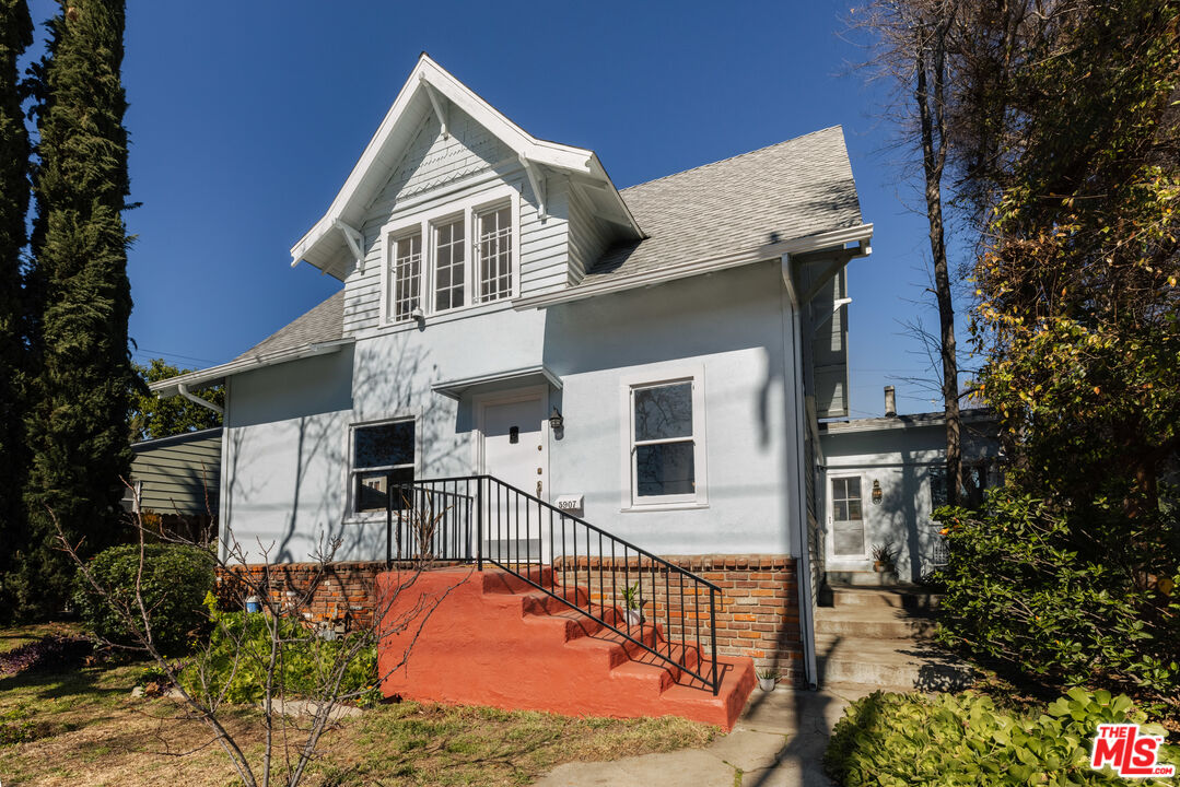 5907 Meridian Street Los Angeles, CA 90042 - Photo 27 of 27 a front view of a house with garage