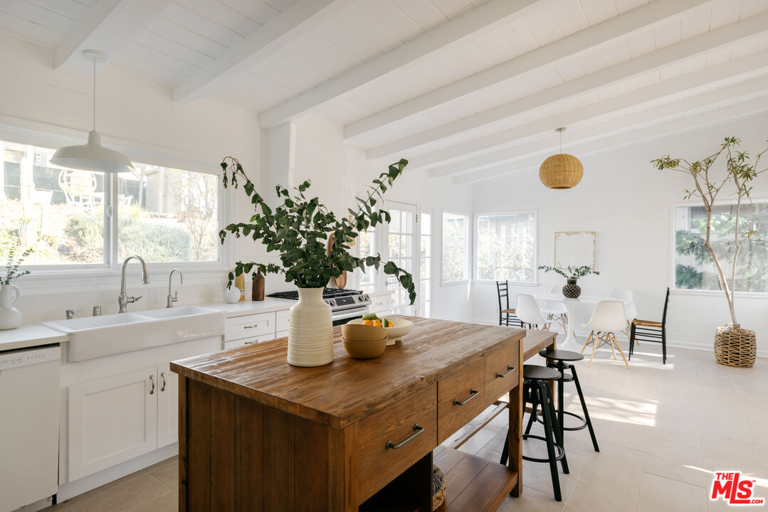 5907 Meridian Street Los Angeles, CA 90042 - Photo 9 of 27 a view of a dining table and a potted plant