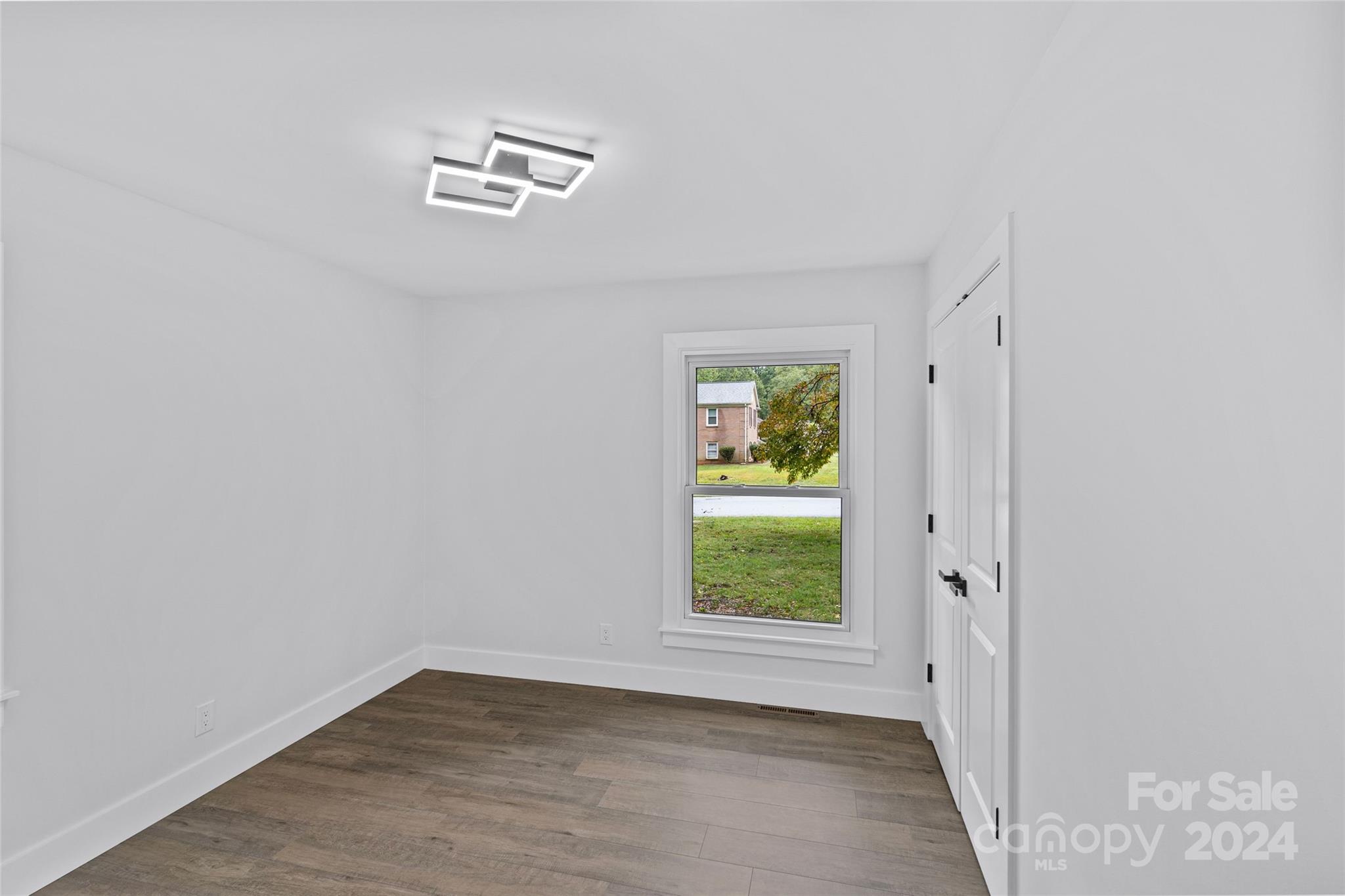 5745 Ruth Drive Charlotte, NC 28215 - Photo 25 of 42 a view of an empty room with a window