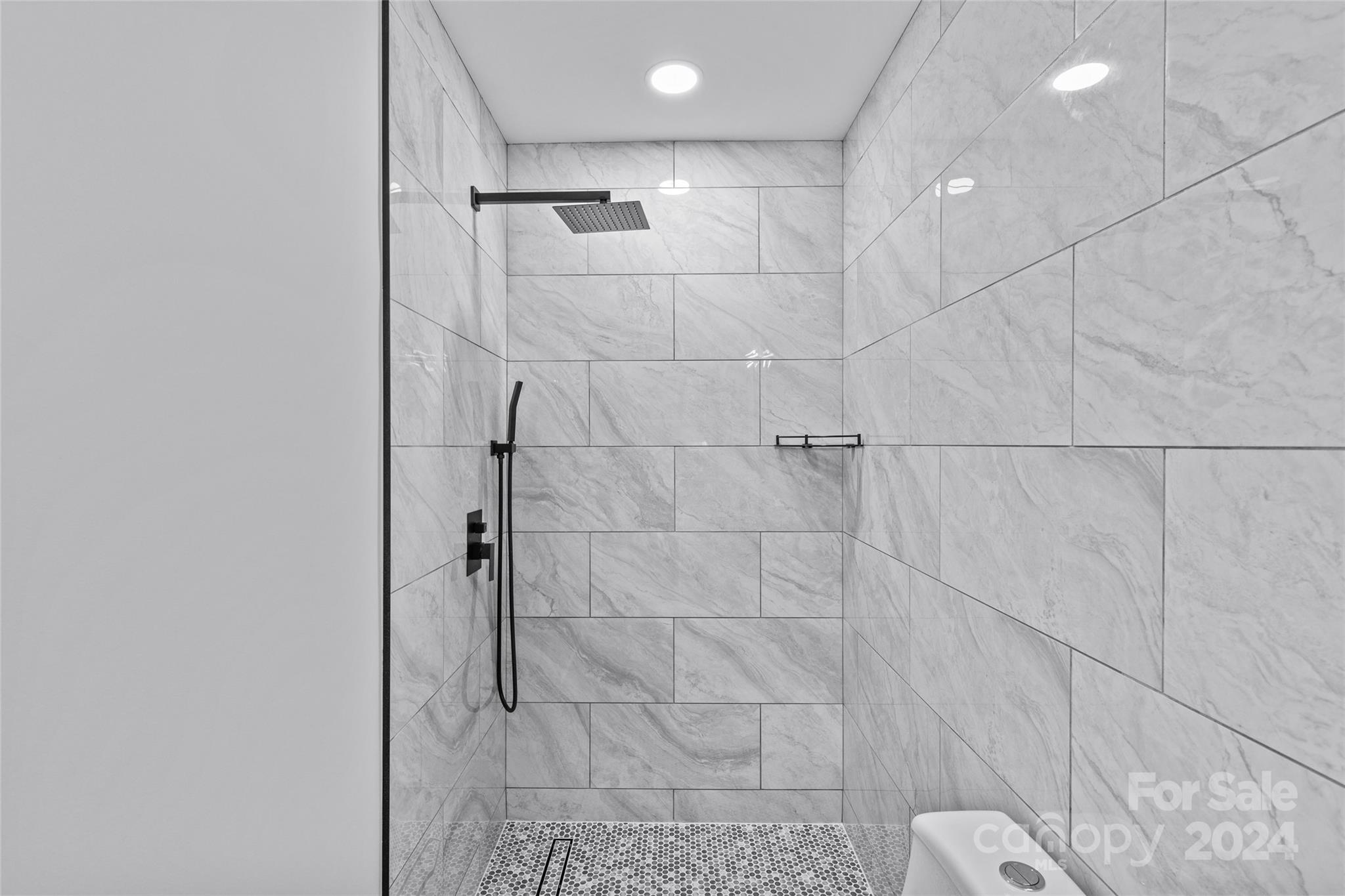 5745 Ruth Drive Charlotte, NC 28215 - Photo 34 of 42 a bathroom with a shower