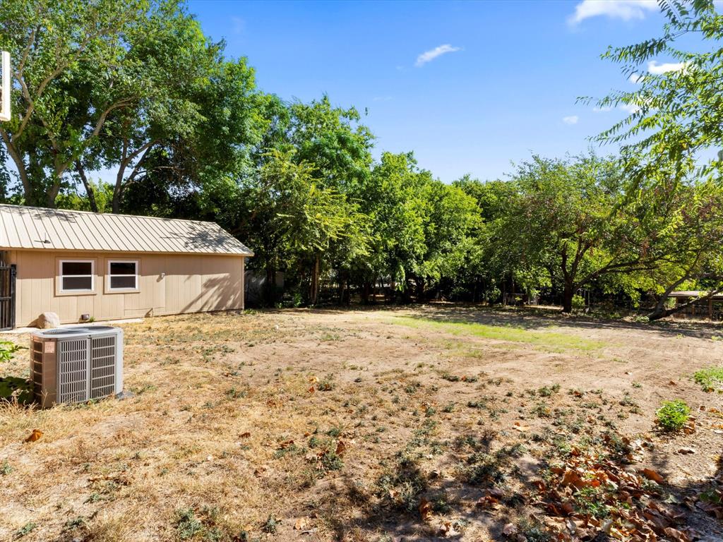 901 South Lane Street Decatur, TX 76234 - Photo 21 of 23 Between re leveling the backyard and Texas Summer, grass will come back (hopefully) this Fall!