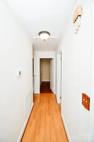a view of a bedroom from a hallway