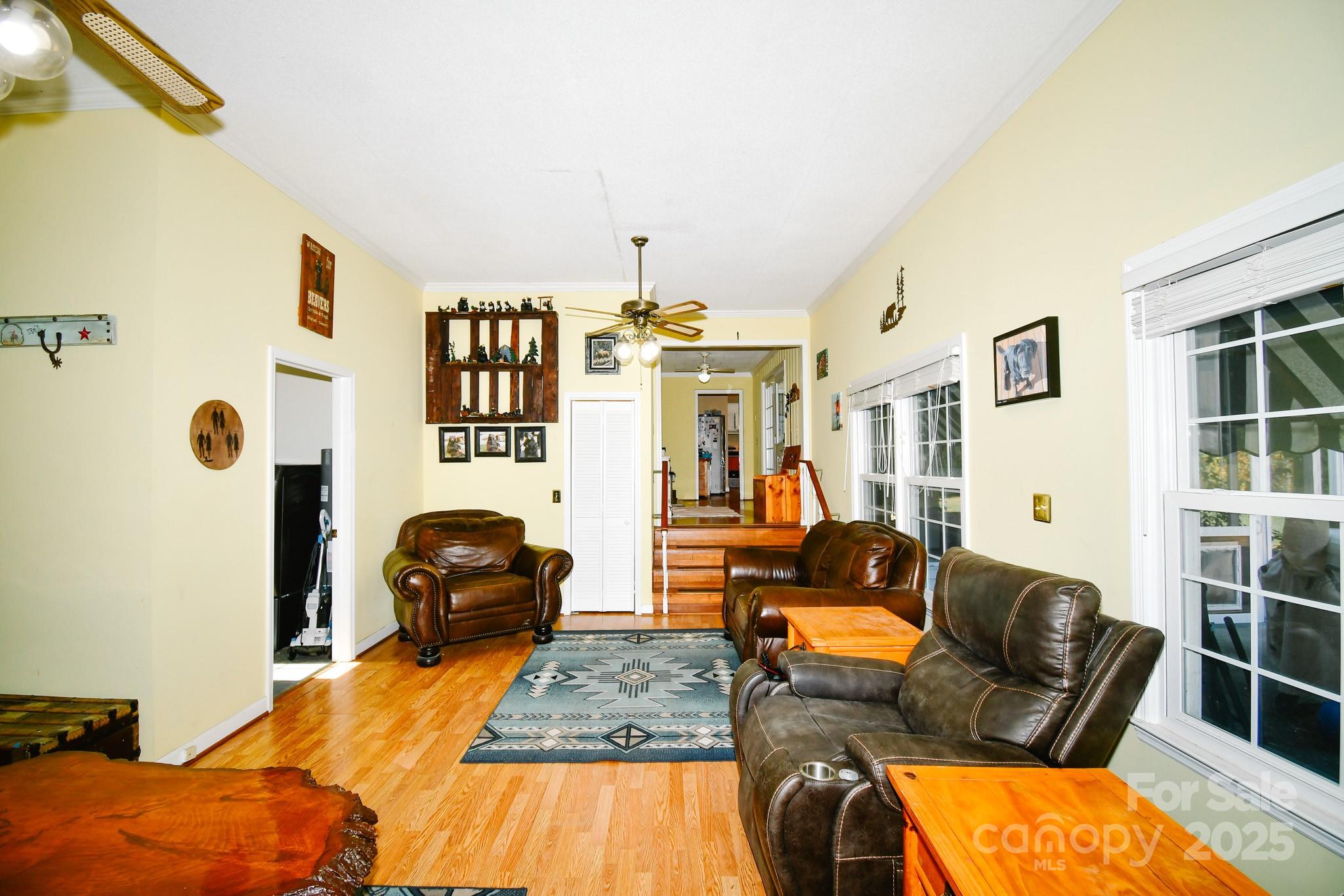3048 Timrod Road Bethune, SC 29009 - Photo 22 of 26 a bedroom with furniture and a wooden floor