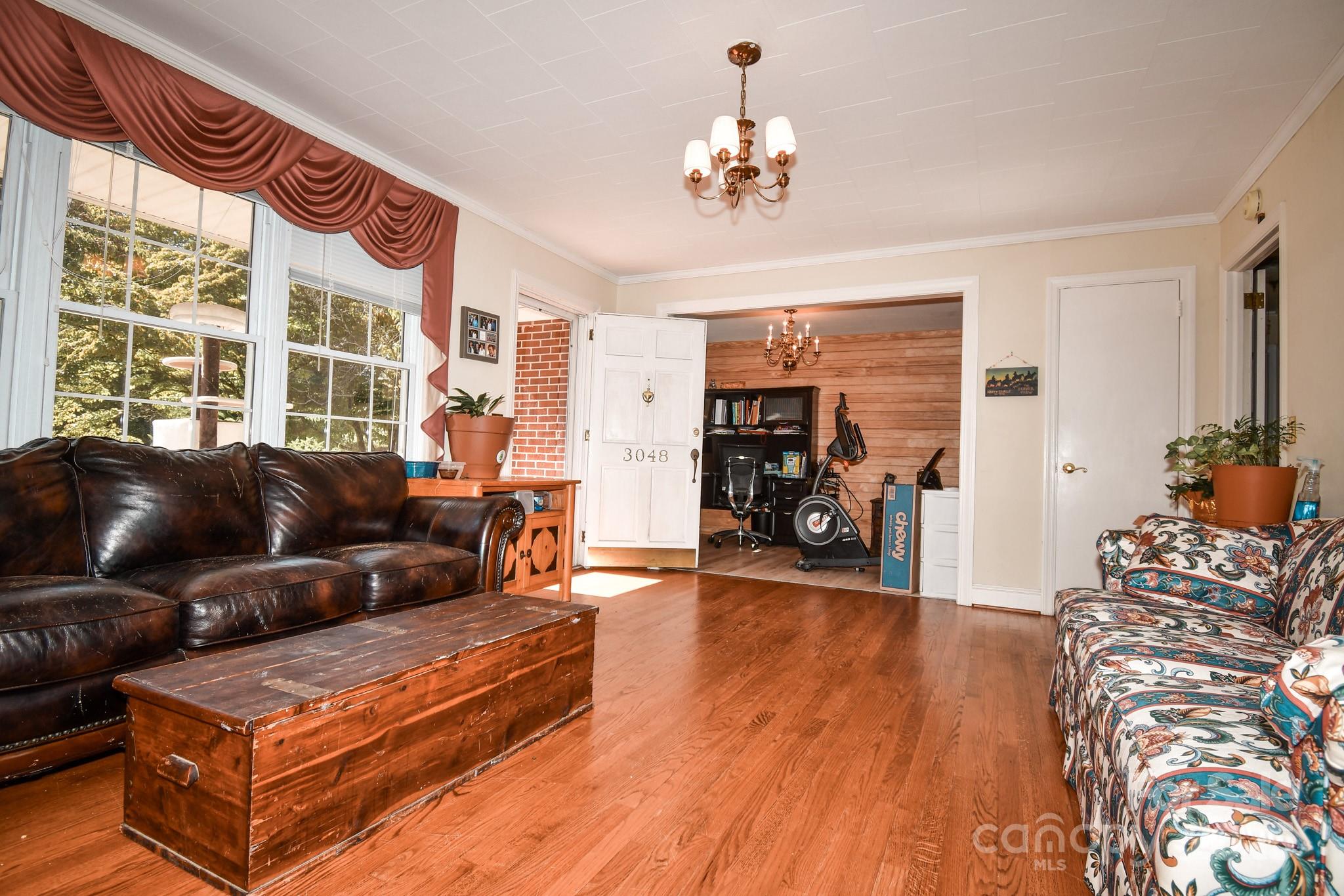 3048 Timrod Road Bethune, SC 29009 - Photo 8 of 26 a living room with furniture and a large window