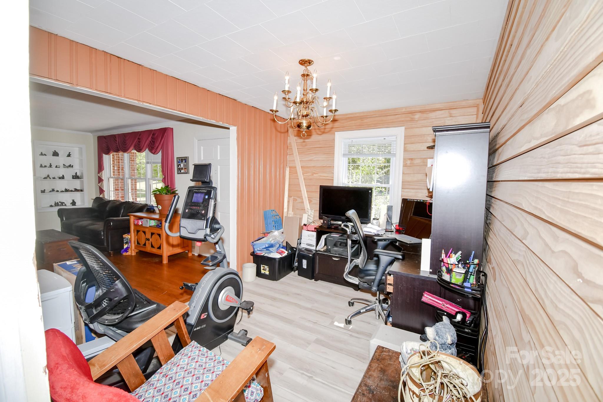 3048 Timrod Road Bethune, SC 29009 - Photo 10 of 26 a view of a livingroom with workspace and a couch