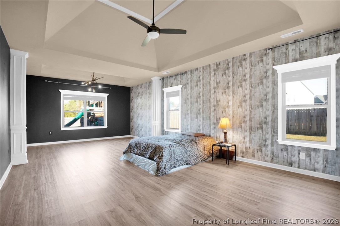 2145 Harrington Road Fayetteville, NC 28306 - Photo 28 of 50 a spacious bedroom with a large bed and a window