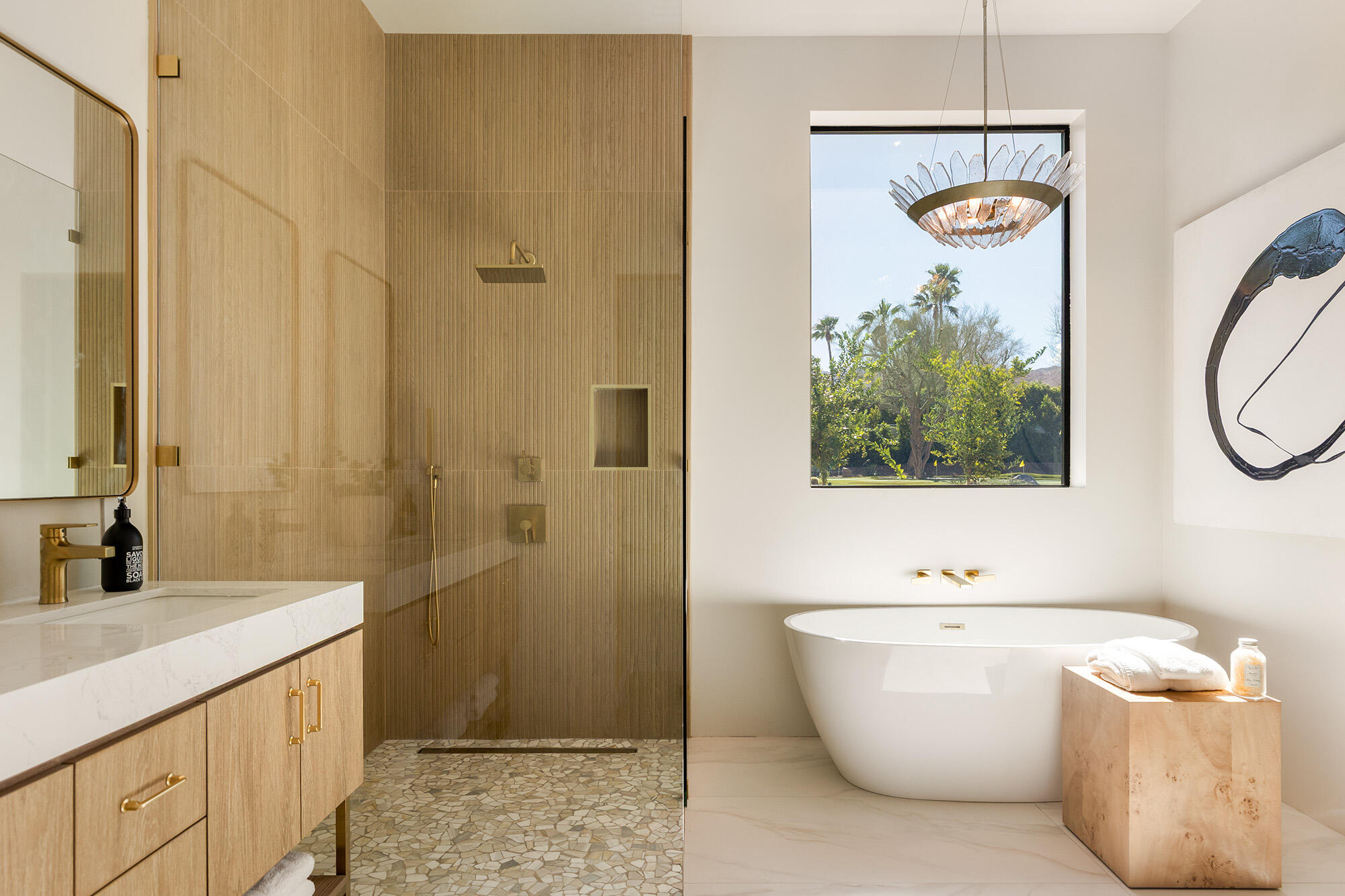 71501 Sahara Road Rancho Mirage, CA 92270 - Photo 13 of 29 a bathroom with a tub sink and mirror
