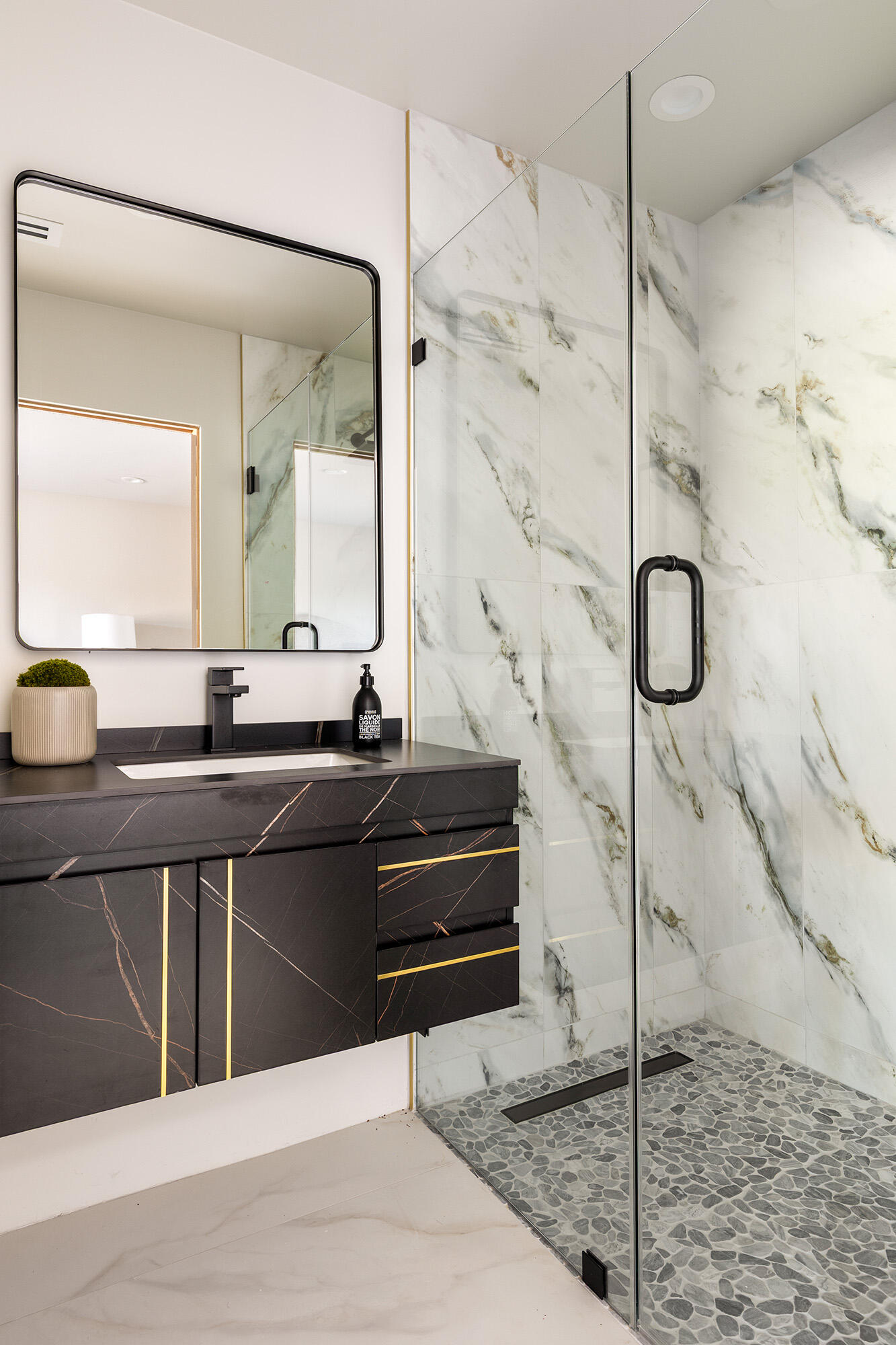 71501 Sahara Road Rancho Mirage, CA 92270 - Photo 18 of 29 a bathroom with a tub sink and mirror