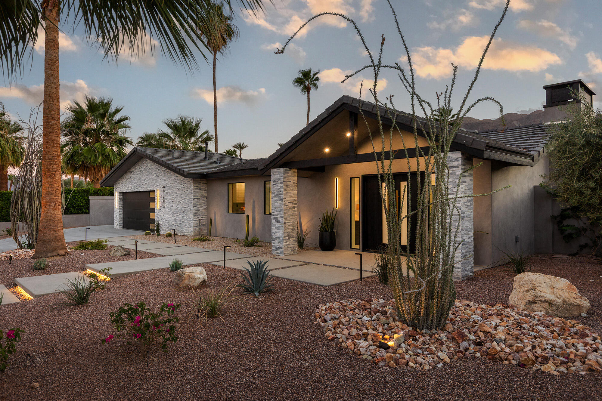 71501 Sahara Road Rancho Mirage, CA 92270 - Photo 2 of 29 a front view of a house with a tree