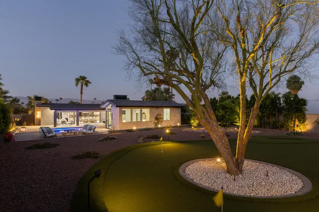 a view of a house with entertaining space