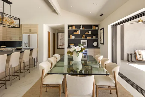 a view of a dining room with furniture