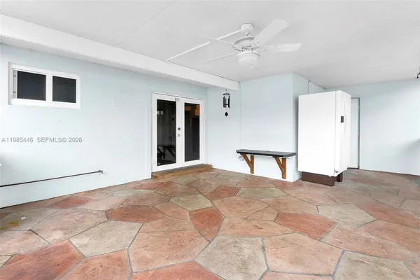 a view of a livingroom with a staircase