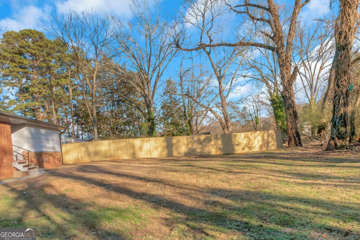 1829 Joy Lake Road Morrow, GA 30260 - Photo 3 of 26 a view of swimming pool with an outdoor space