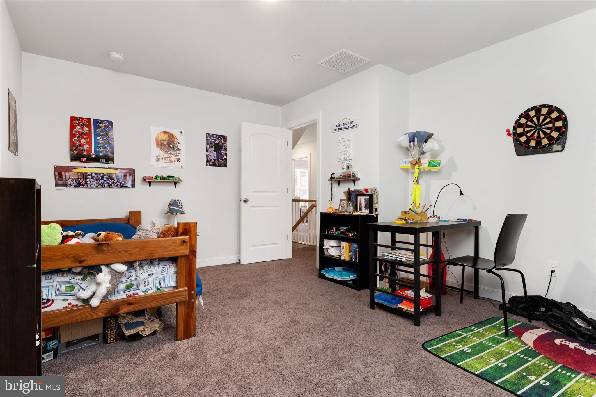 720 Bridge Drive Pasadena, MD 21122 - Photo 22 of 46 a bedroom with furniture and a wooden floor
