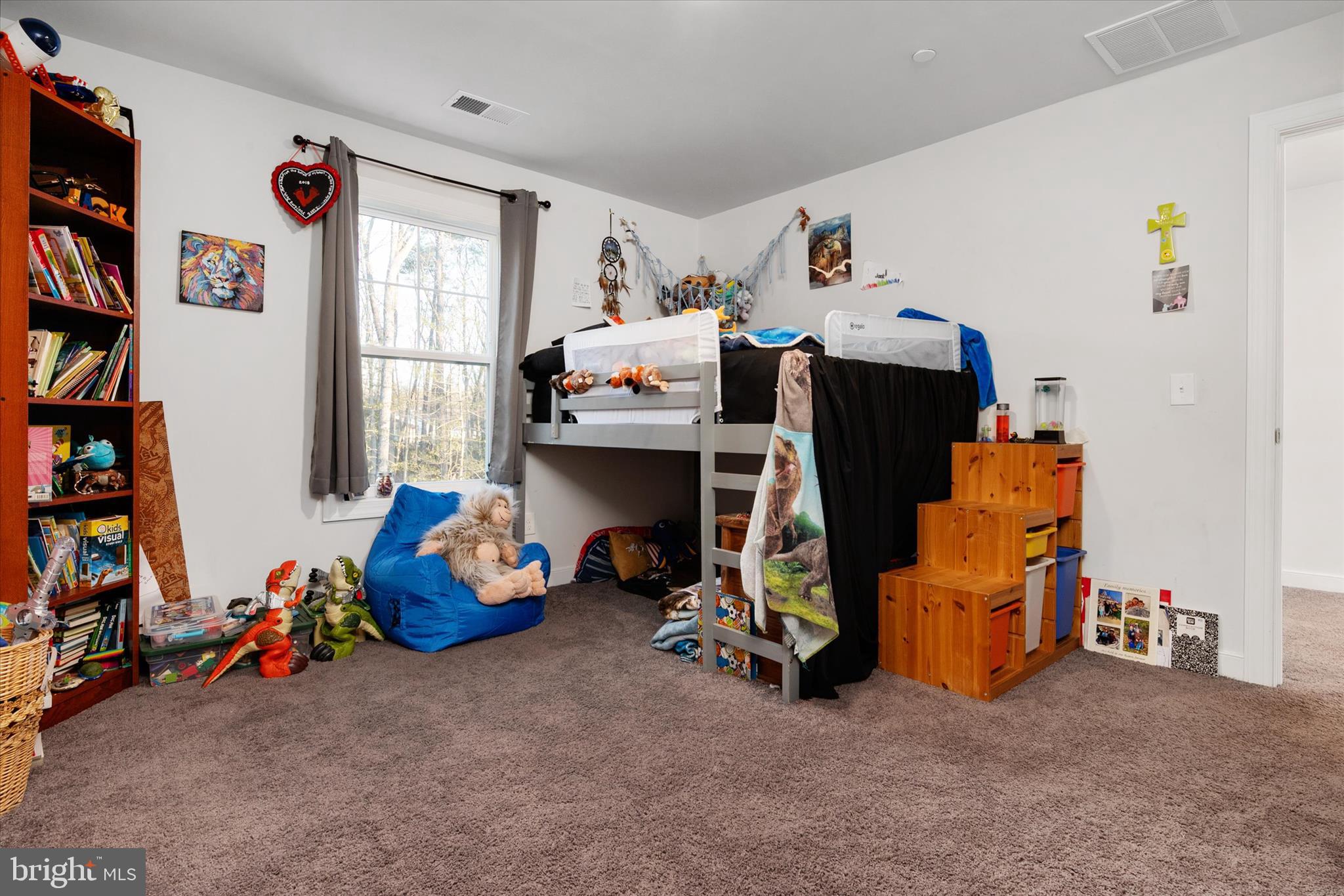 720 Bridge Drive Pasadena, MD 21122 - Photo 23 of 46 a room with furniture and a large window