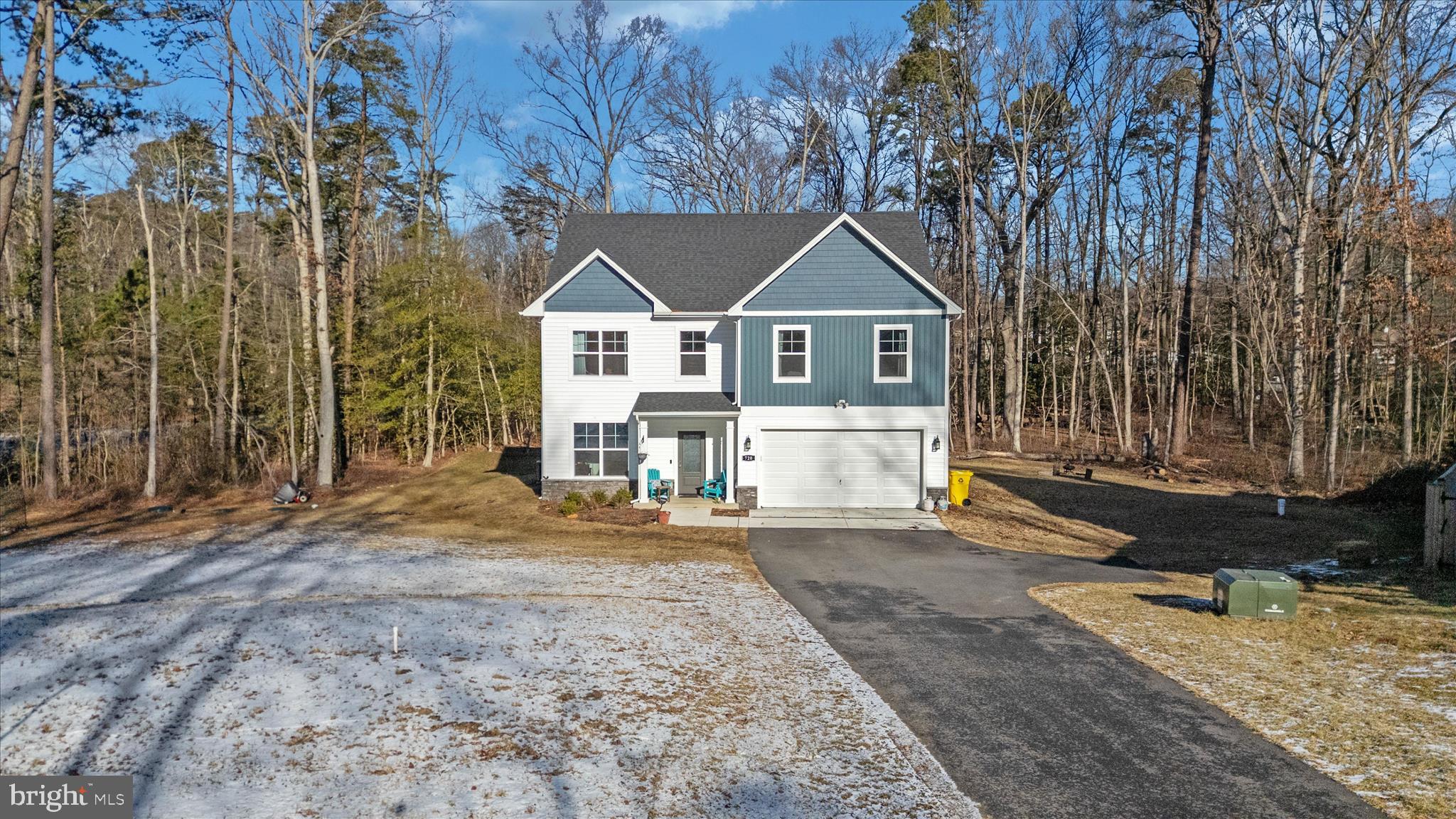 720 Bridge Drive Pasadena, MD 21122 - Photo 3 of 46 a front view of a house with a yard