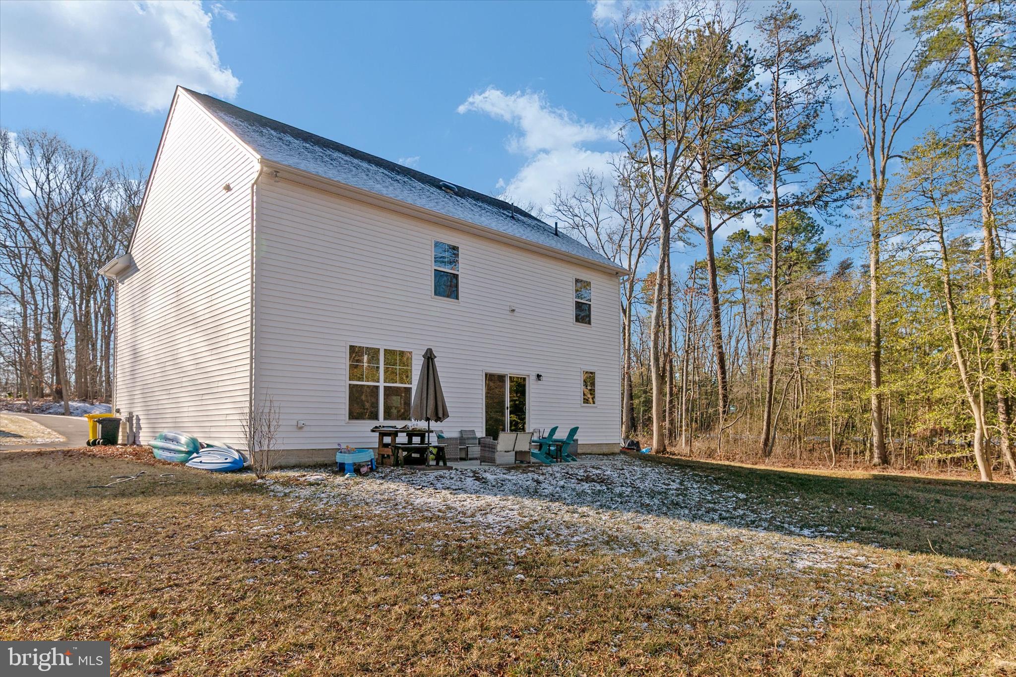 720 Bridge Drive Pasadena, MD 21122 - Photo 39 of 46 a view of a house with backyard and trees