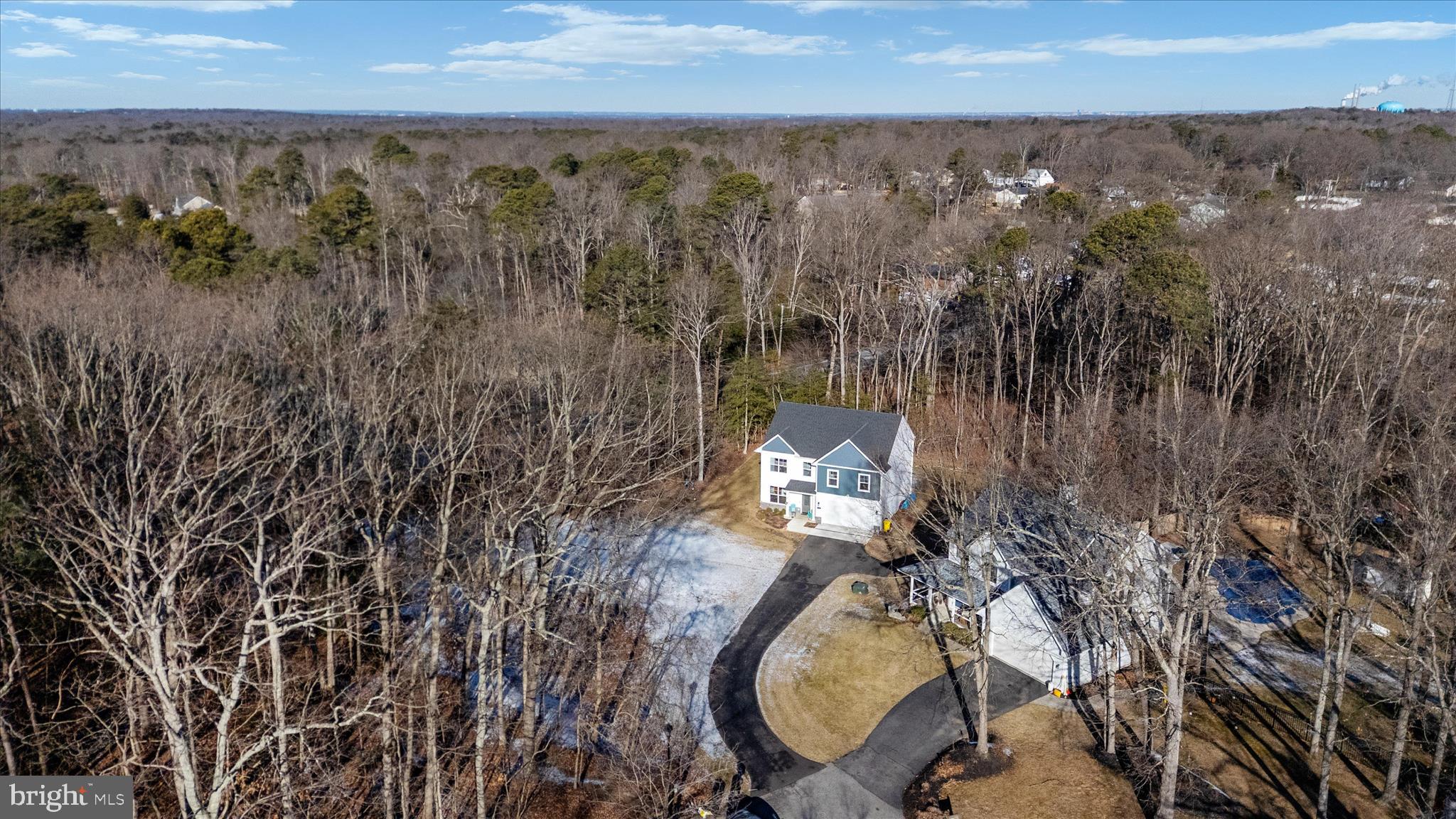 720 Bridge Drive Pasadena, MD 21122 - Photo 5 of 46 an aerial view of a house with swimming pool and mountain view