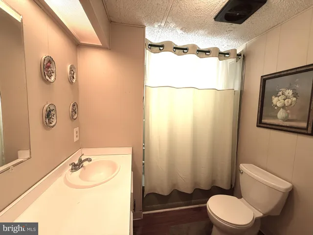 a view of an empty room and a gallery