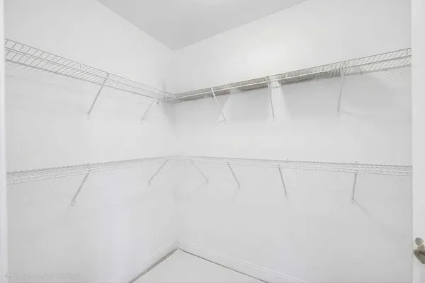a view of a room with racks on the wall