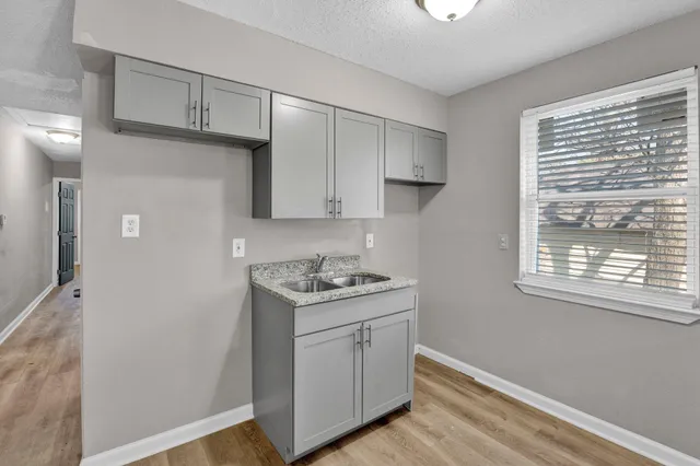 a white toilet and a shower curtain