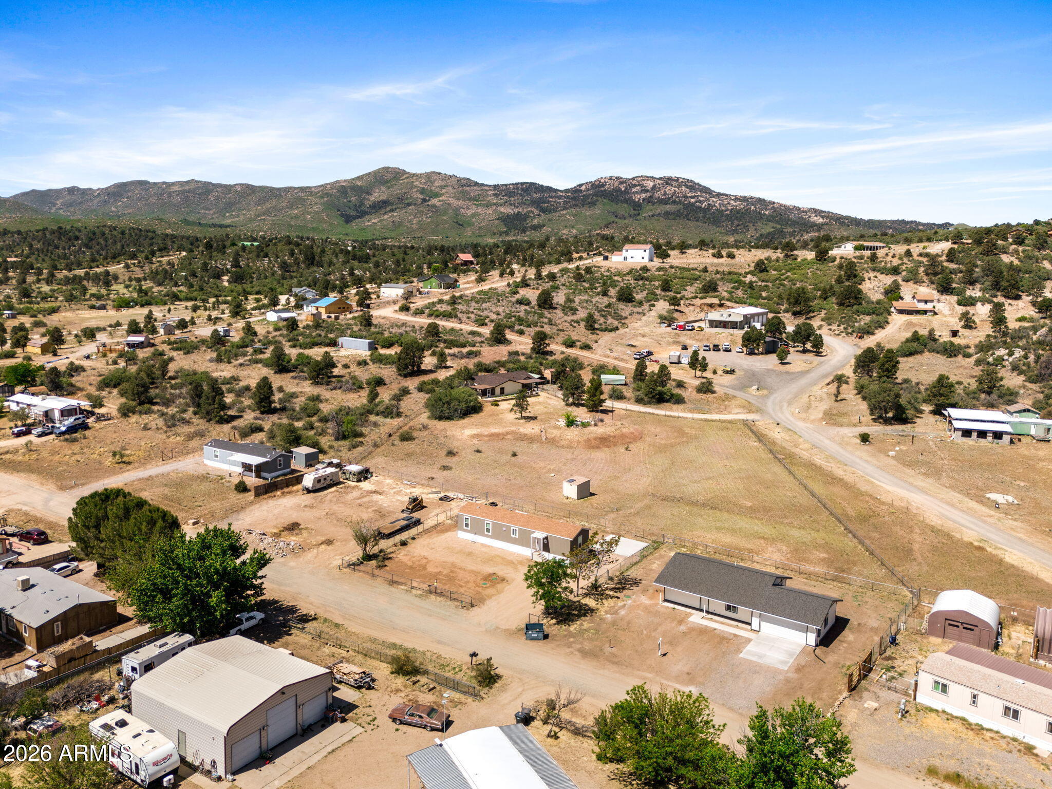 18296 Frontier Road Peeples Valley, AZ 86332 - Photo 5 of 44 an aerial view of residential houses with outdoor space