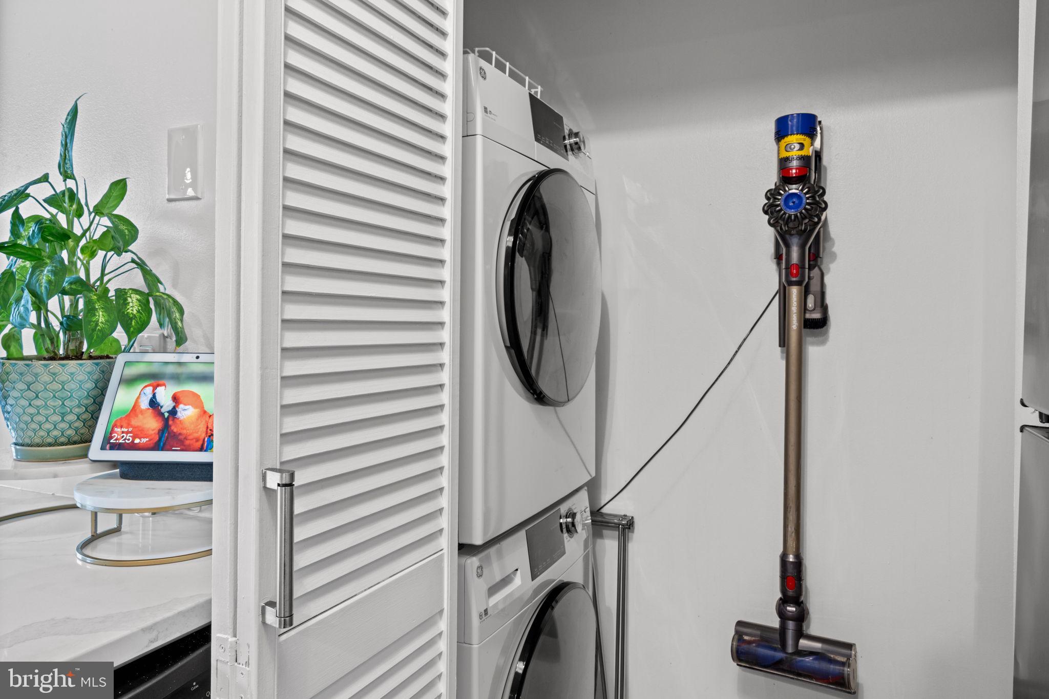 2429 Locust Street, Unit 314 Philadelphia, PA 19103 - Photo 4 of 21 a utility room with dryer and washer
