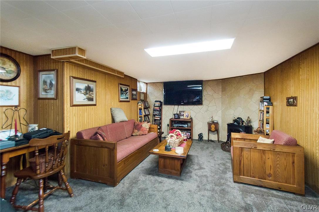4479 Shankweiler Road Orefield, PA 18069 - Photo 21 of 30 a living room with furniture and a flat screen tv