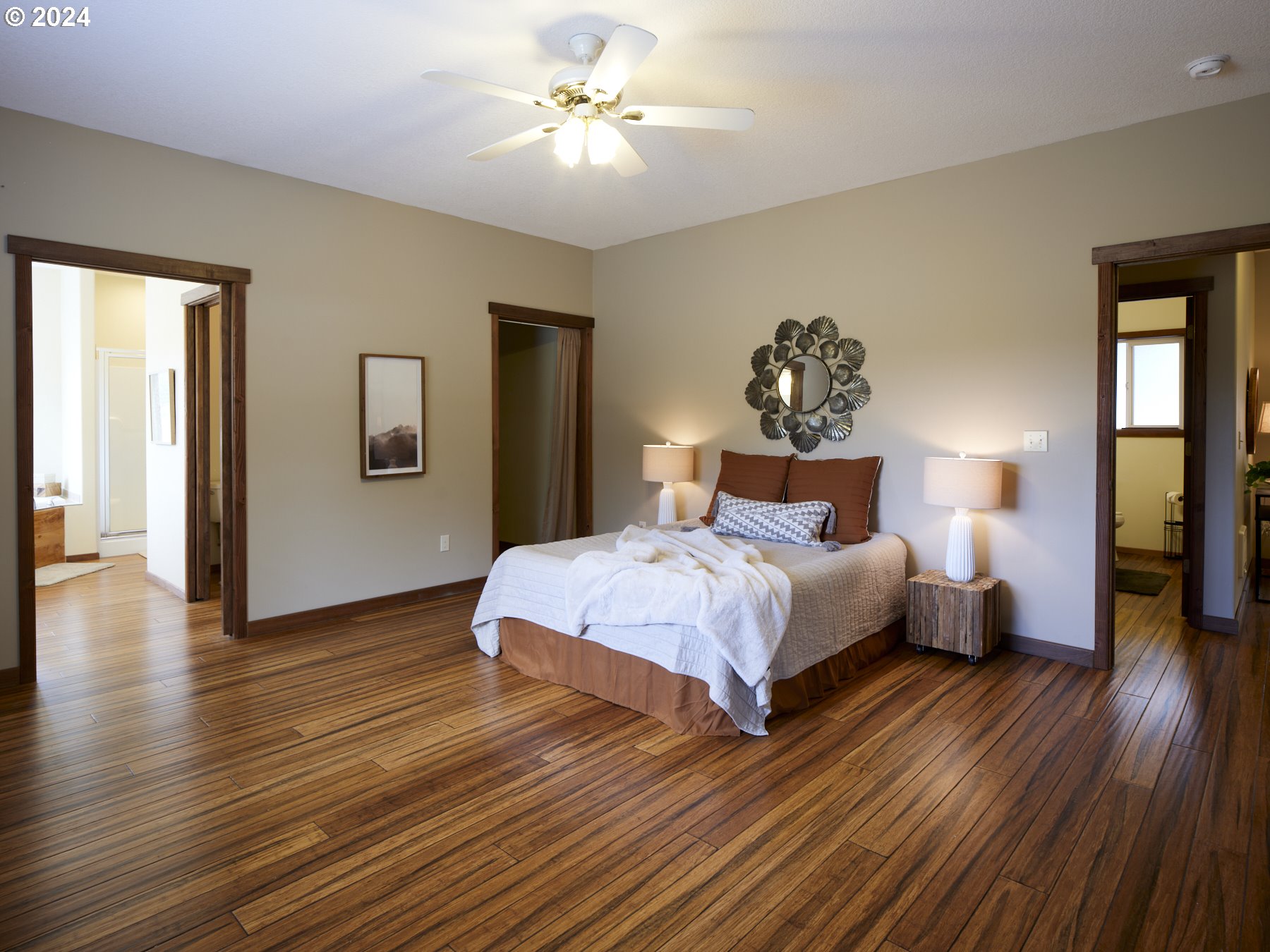 29902 Northwest 51st Avenue Ridgefield, WA 98642 - Photo 19 of 46 a bedroom with bed and wooden floor