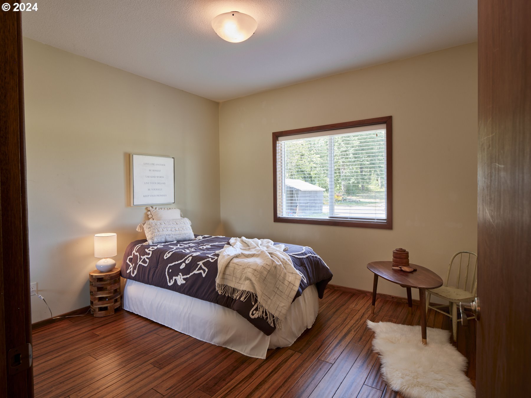 29902 Northwest 51st Avenue Ridgefield, WA 98642 - Photo 26 of 46 a bedroom with a bed and a window