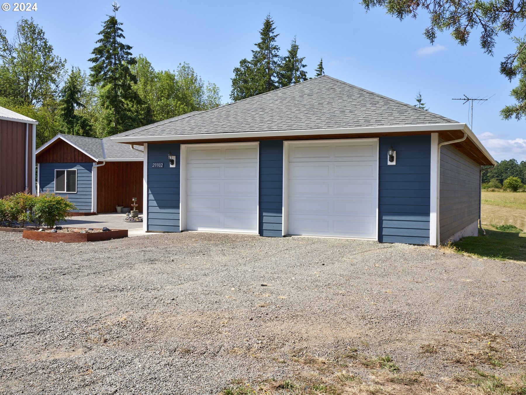 29902 Northwest 51st Avenue Ridgefield, WA 98642 - Photo 3 of 46 a house with a outdoor space