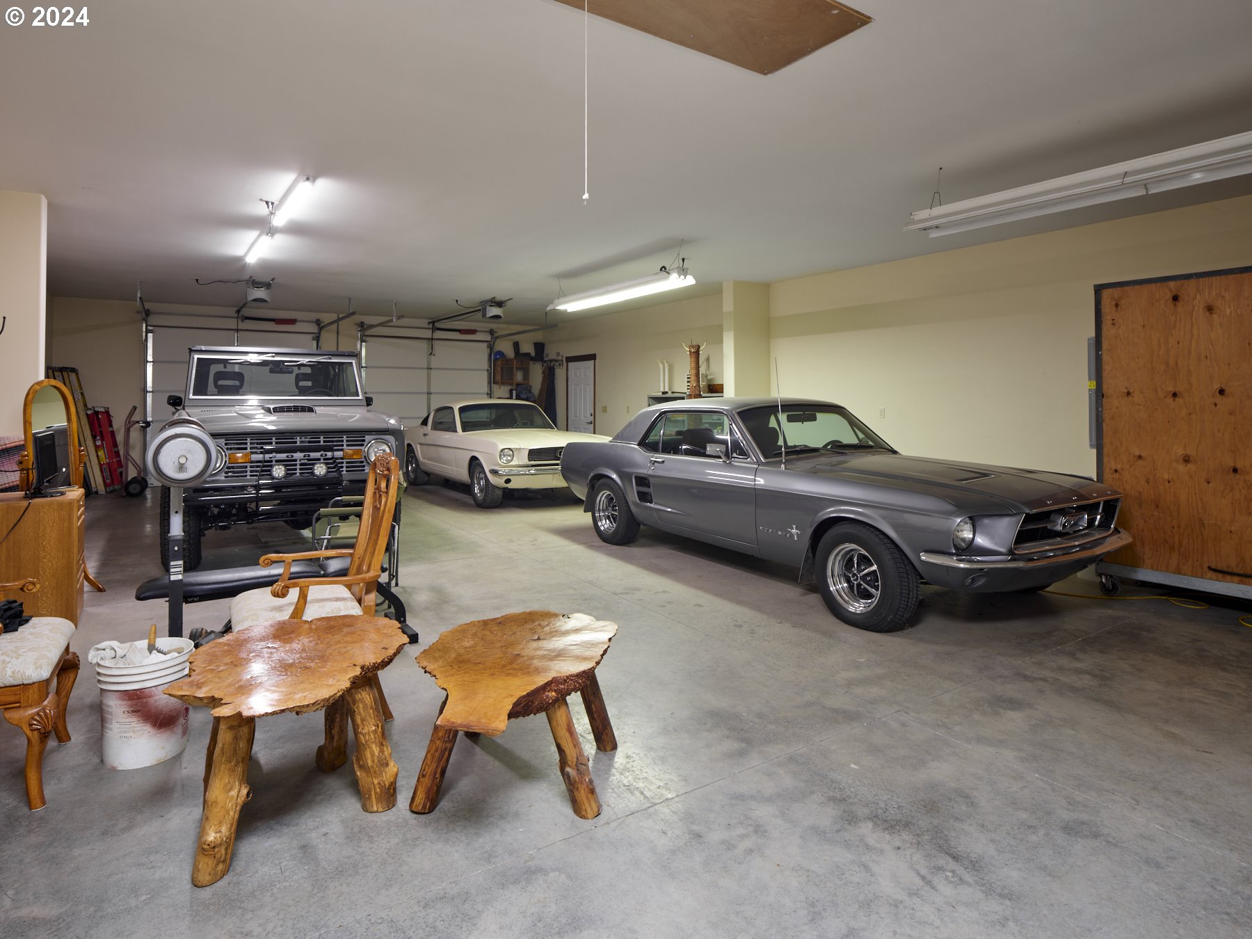29902 Northwest 51st Avenue Ridgefield, WA 98642 - Photo 31 of 46 a view of a garage with a car parked in it