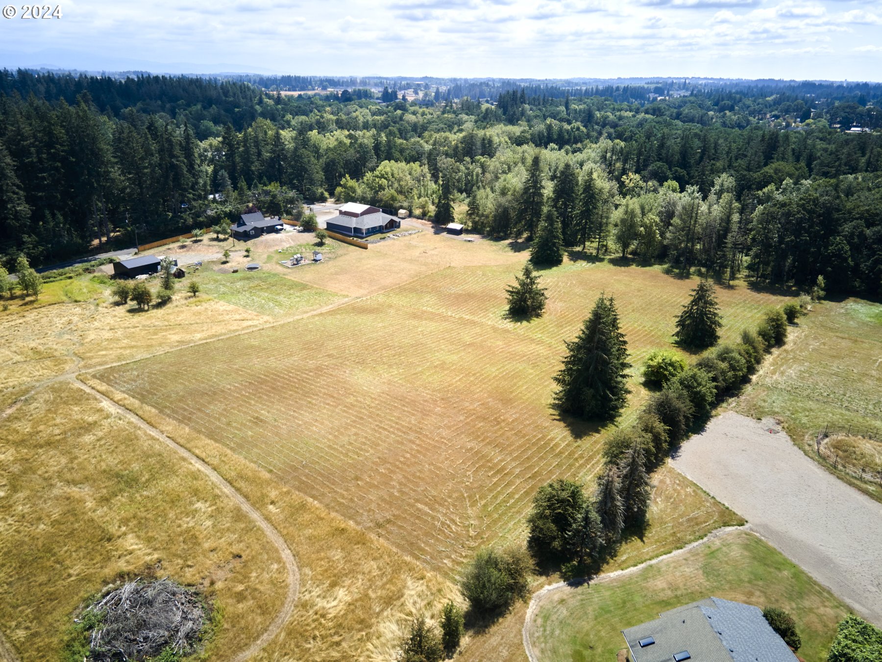 29902 Northwest 51st Avenue Ridgefield, WA 98642 - Photo 38 of 46 a view of a swimming pool with a yard