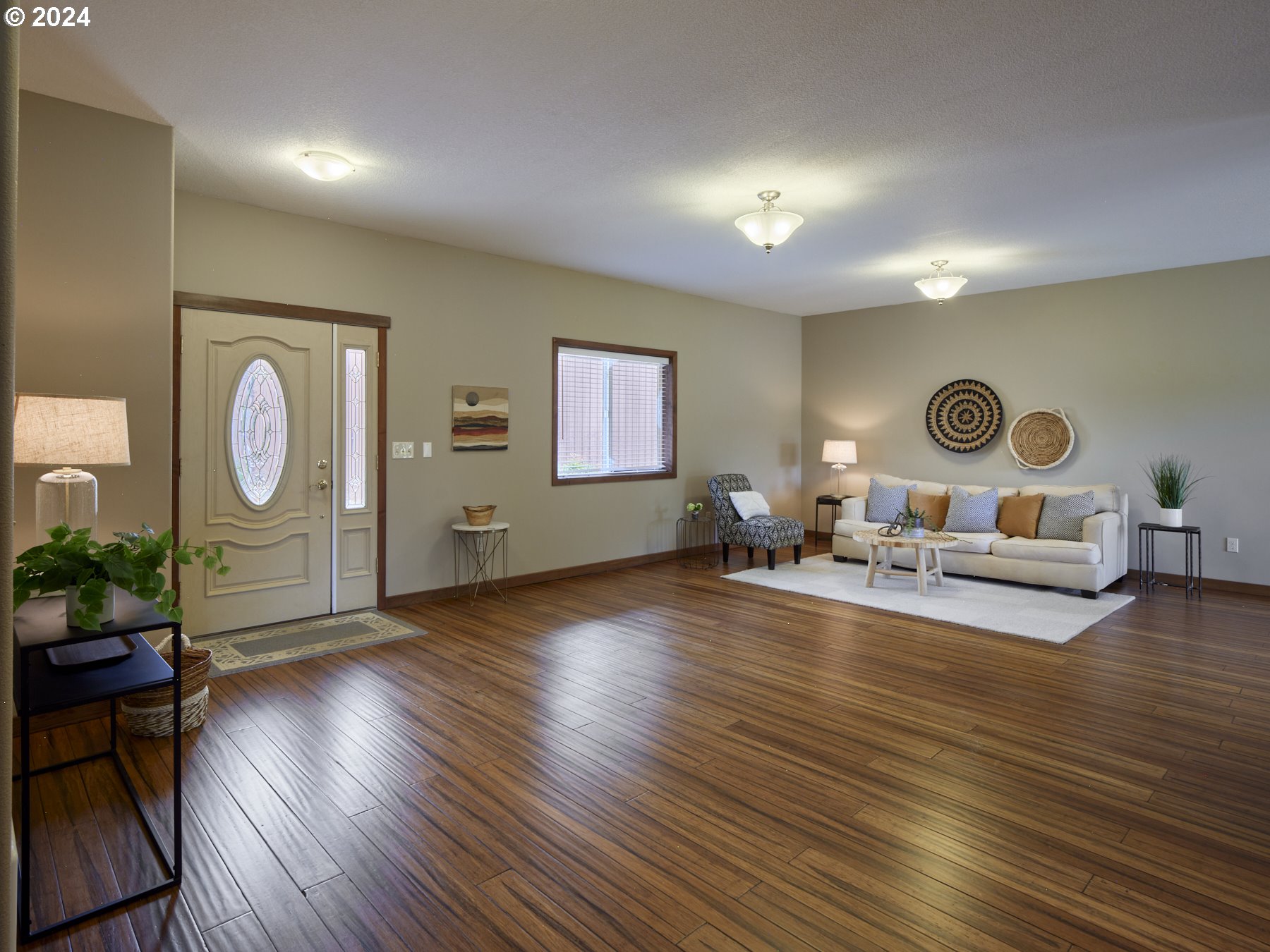 29902 Northwest 51st Avenue Ridgefield, WA 98642 - Photo 7 of 46 a living room with furniture and wooden floor
