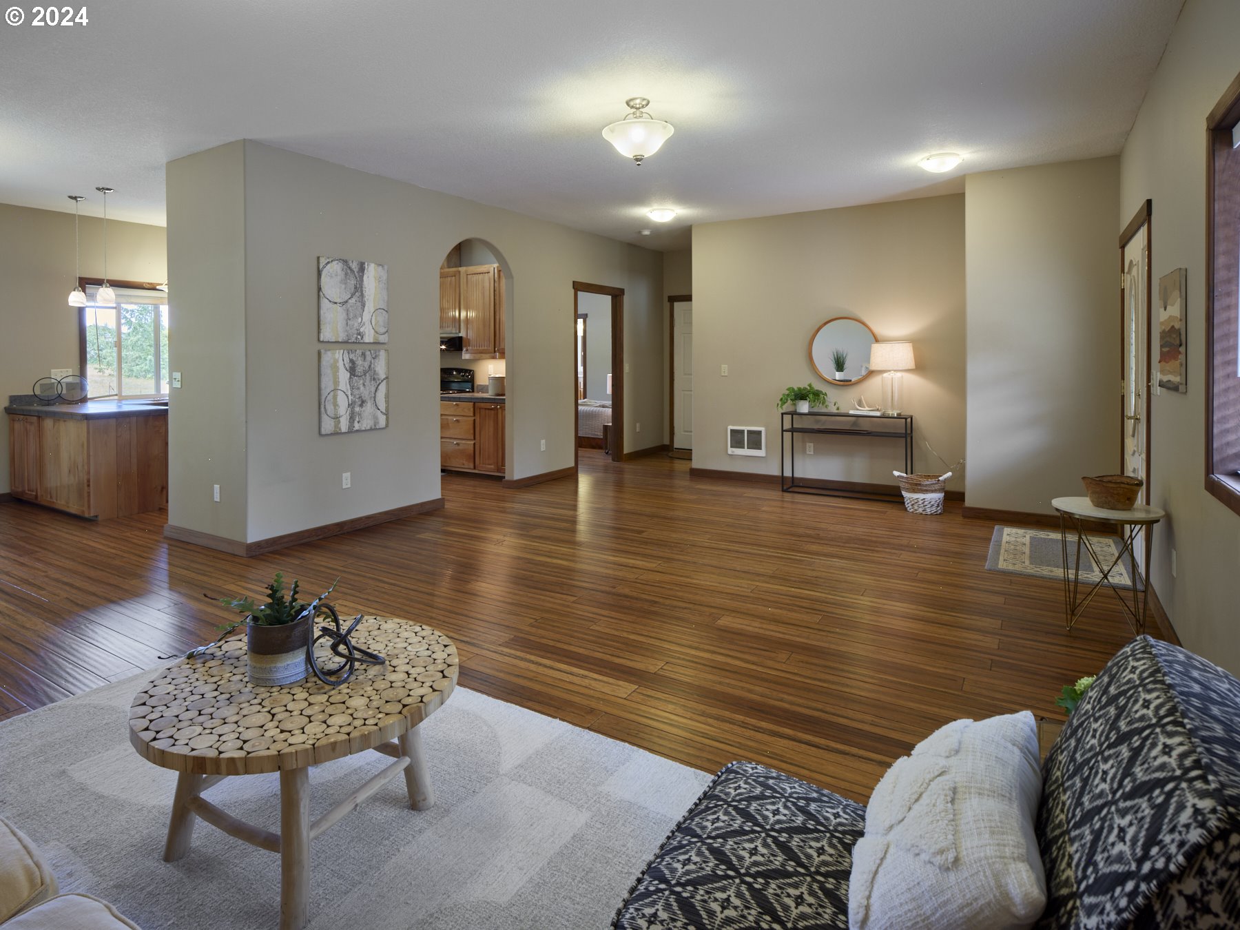 29902 Northwest 51st Avenue Ridgefield, WA 98642 - Photo 9 of 46 a living room with furniture and a wooden floor