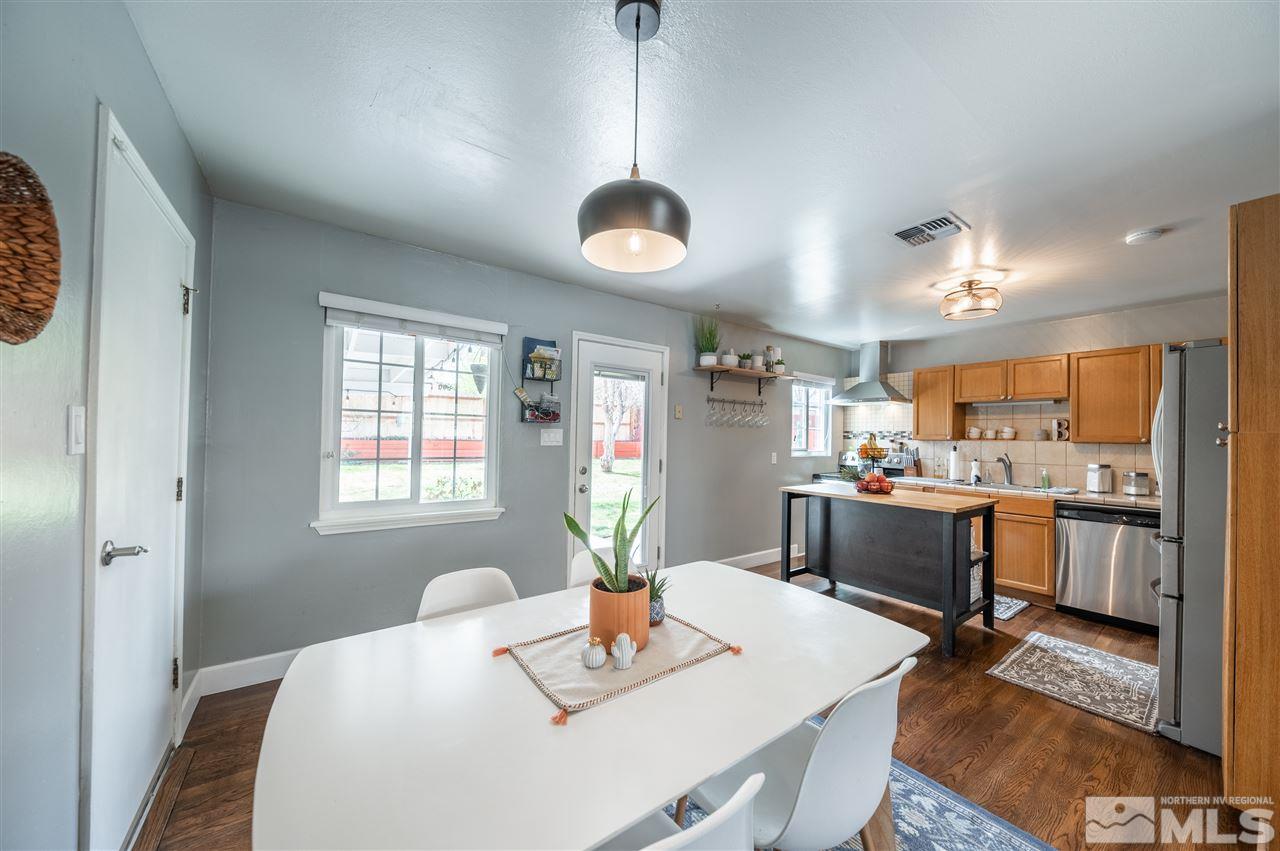 835 Ruby Avenue Reno, NV 89503 - Photo 5 of 18 a dining room with furniture and window