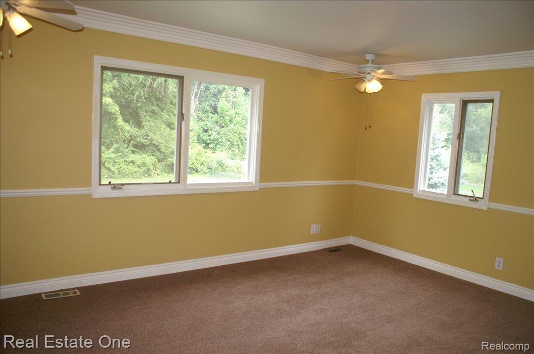 1955 White Lake Road Highland, MI 48356 - Photo 14 of 25 LG MASTER SUITE