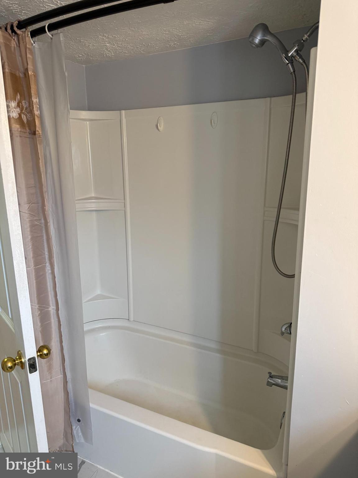 478 Mirabile Lane Baltimore, MD 21224 - Photo 18 of 23 a bathroom with a shower and a bath tub