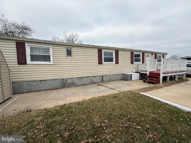 a house view with a backyard space