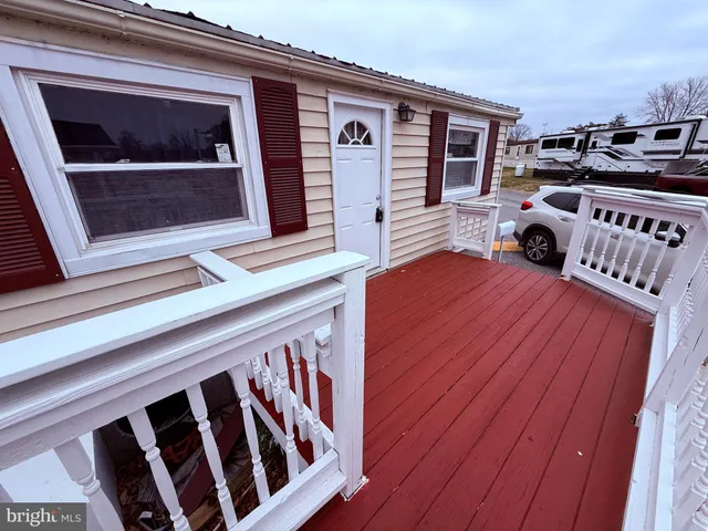a view of an chairs in the balcony