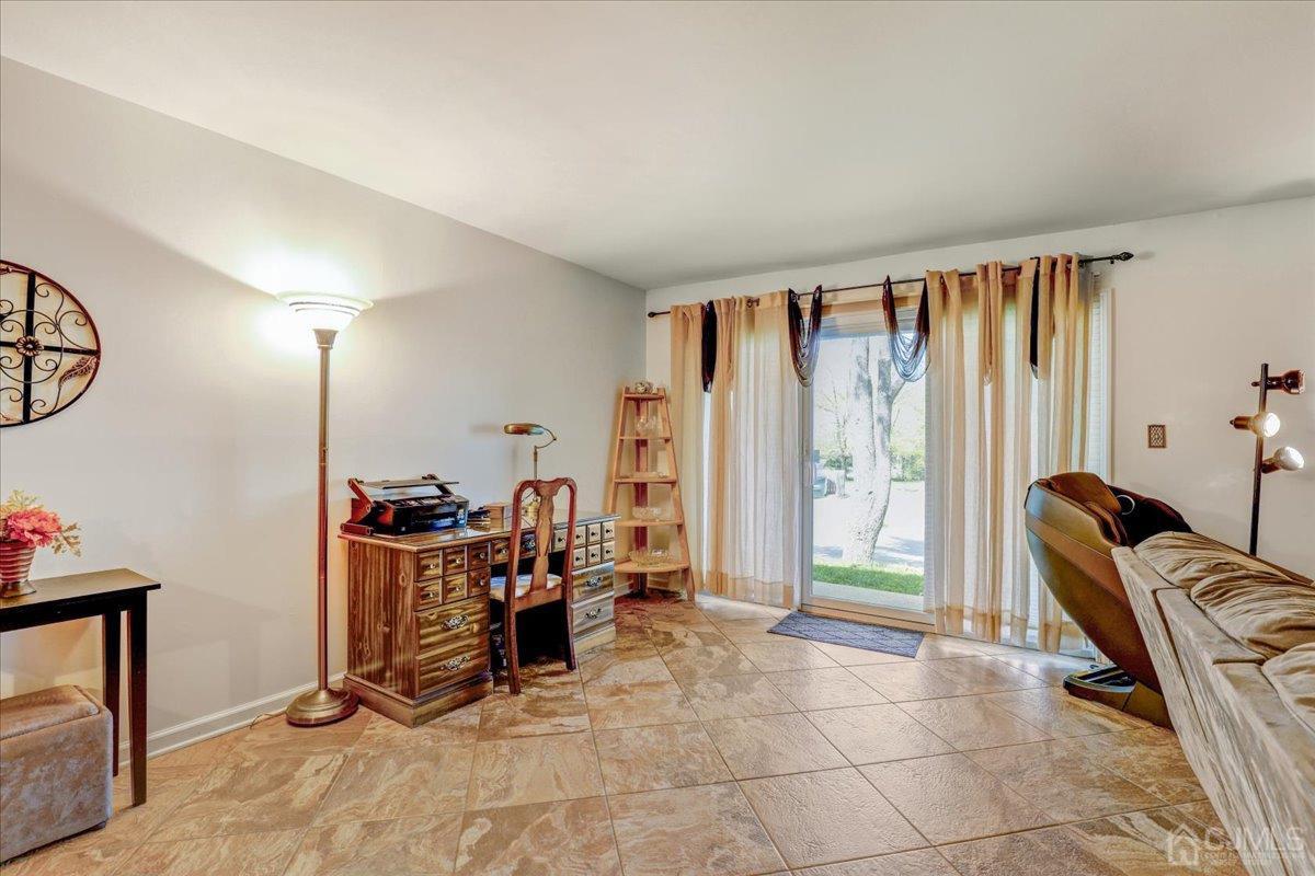 95 Neilly Court Old Bridge, NJ 08857 - Photo 11 of 35 a view of a room with furniture and a flat screen tv