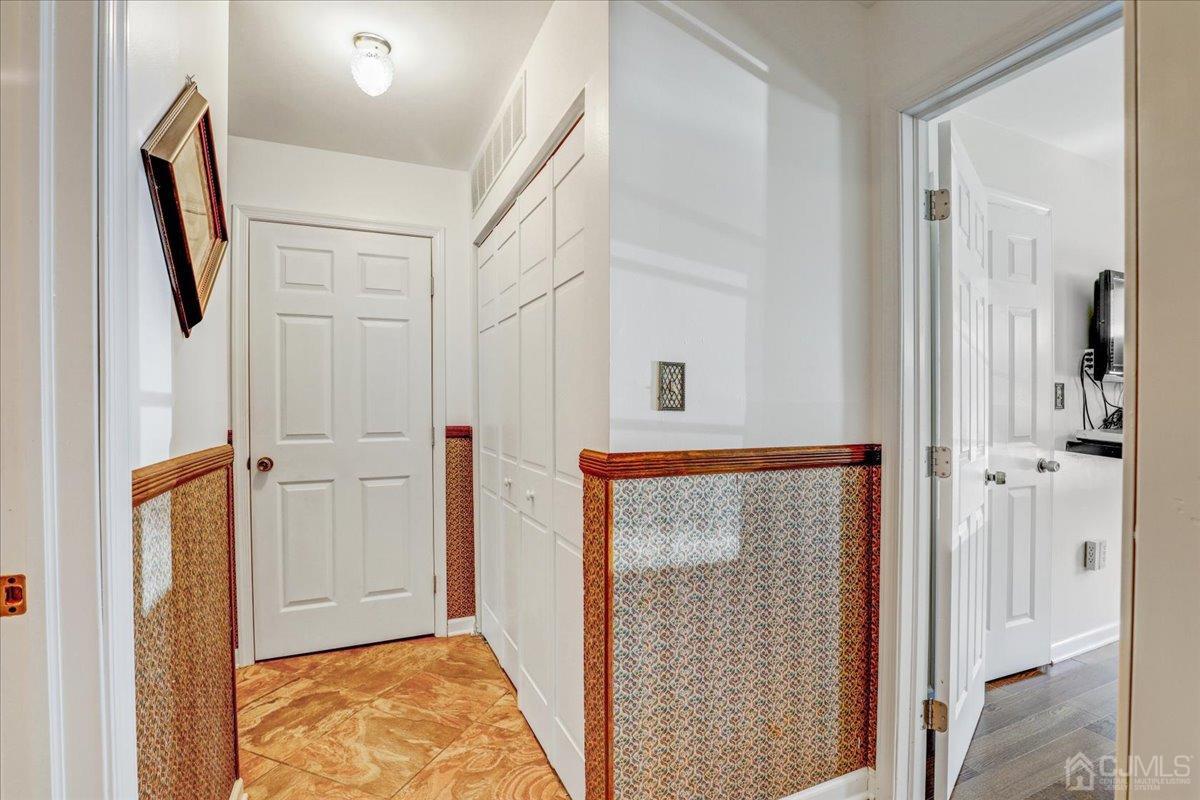 95 Neilly Court Old Bridge, NJ 08857 - Photo 14 of 35 a view of front door with hallway