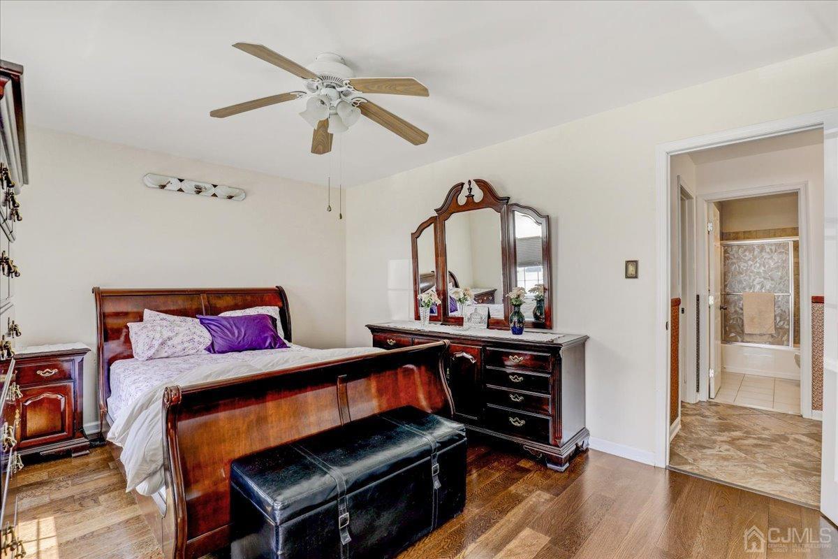95 Neilly Court Old Bridge, NJ 08857 - Photo 16 of 35 a living room with furniture and wooden floor
